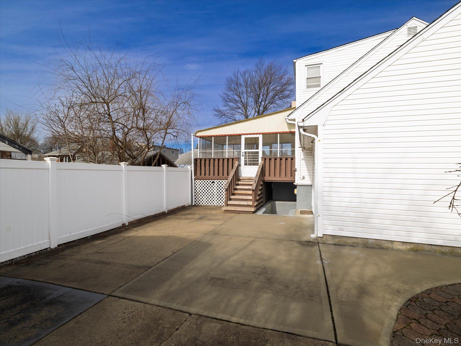 158 Roosevelt Avenue Freeport, NY 11520 - Photo 22 of 30 a view of a house with a backyard