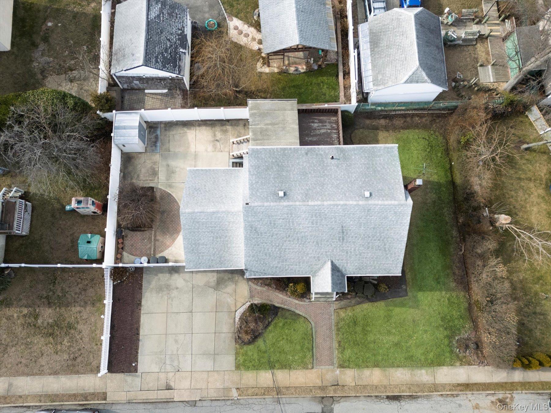 158 Roosevelt Avenue Freeport, NY 11520 - Photo 25 of 30 an aerial view of residential houses with outdoor space