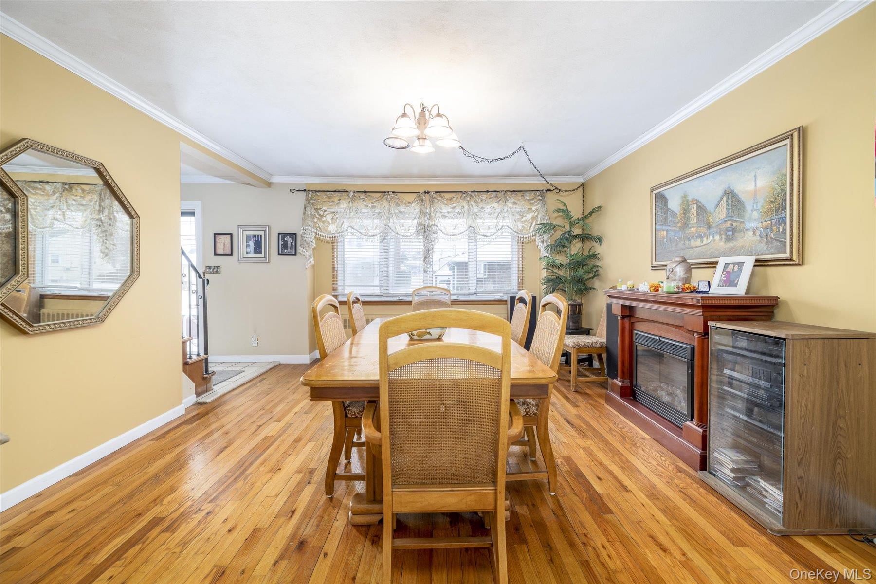 158 Roosevelt Avenue Freeport, NY 11520 - Photo 4 of 30 a view of a dining room with furniture window and wooden floor