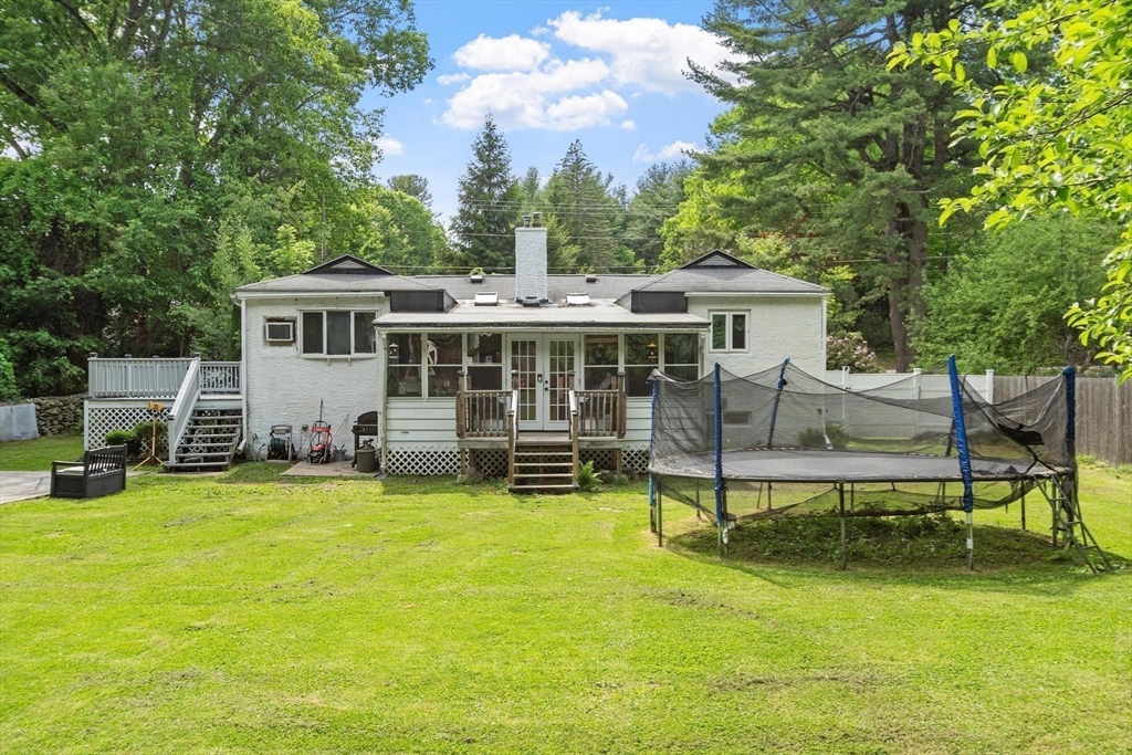 144 Bailey Road Holden, MA 01520 - Photo 38 of 42 a view of a house with swimming pool and sitting area