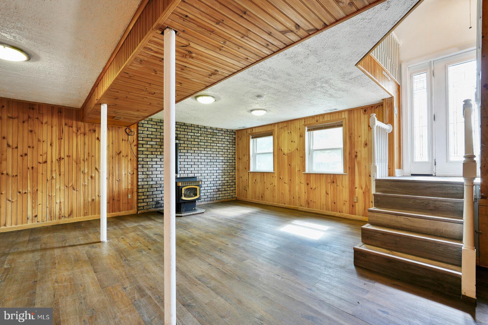 1142 Calvert Beach Road St. Leonard, MD 20685 - Photo 37 of 63 a view of an entryway with wooden floor and door