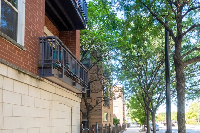 a view of pathway with a house in the background