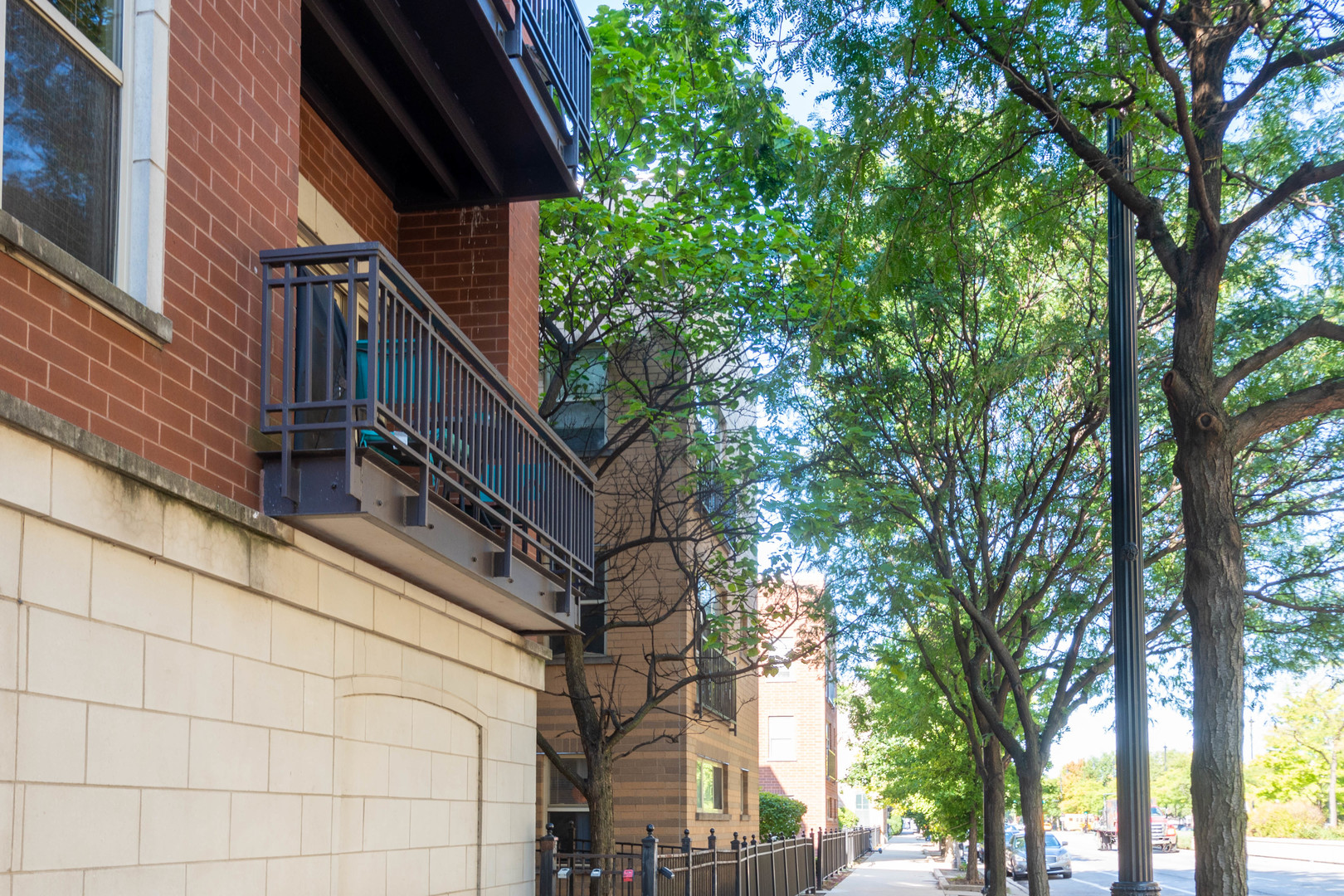 1075 West Roosevelt Road, Unit 201 Chicago, IL 60608 - Photo 15 of 21 a view of pathway with a house in the background