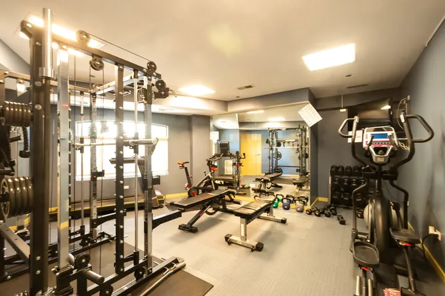 a view of a room with gym equipment