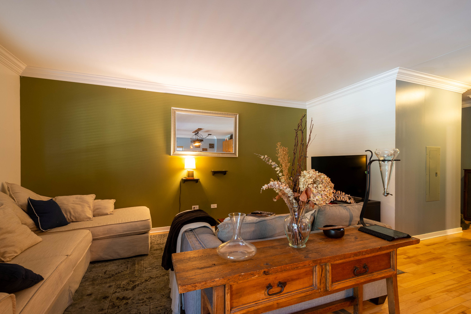 1075 West Roosevelt Road, Unit 201 Chicago, IL 60608 - Photo 2 of 21 a bedroom with furniture and a air conditioner vent