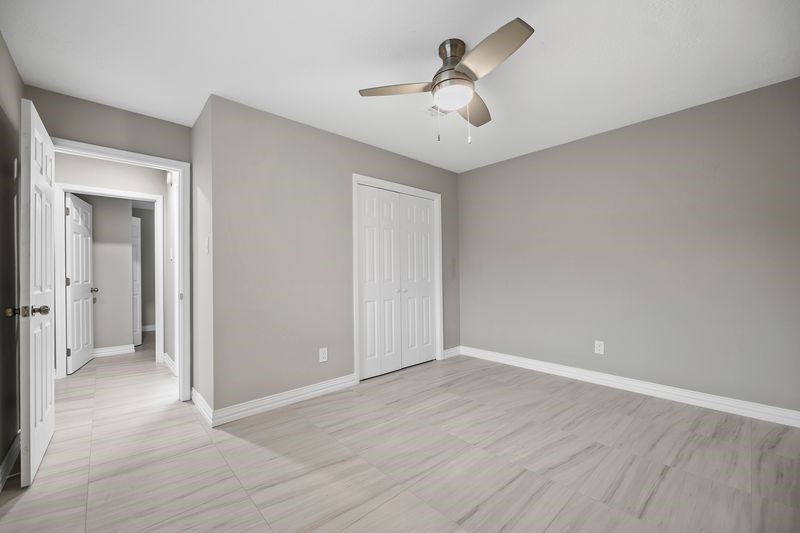16519 Gaeldom Drive Houston, TX 77084 - Photo 17 of 28 wooden floor in an empty room