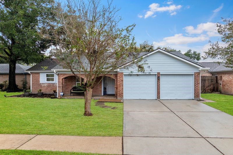 16519 Gaeldom Drive Houston, TX 77084 - Photo 2 of 28 a front view of house with yard