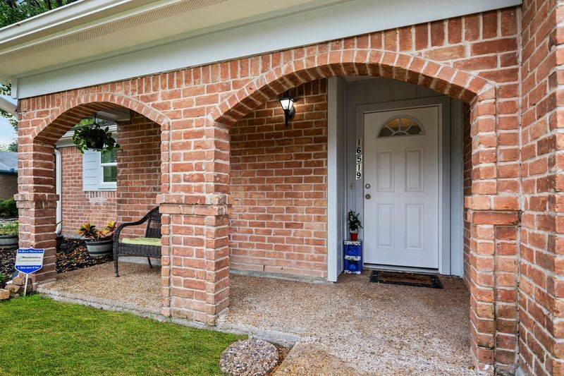 16519 Gaeldom Drive Houston, TX 77084 - Photo 4 of 28 a view of front door and porch