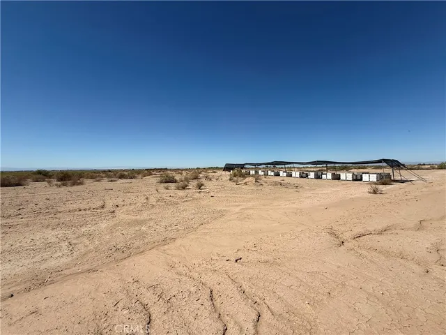 a picture of a bench in front of a wall