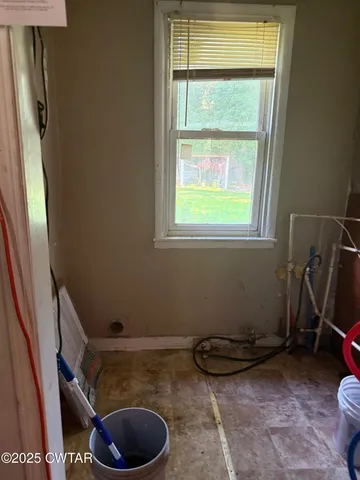 a bathroom with a toilet and a sink