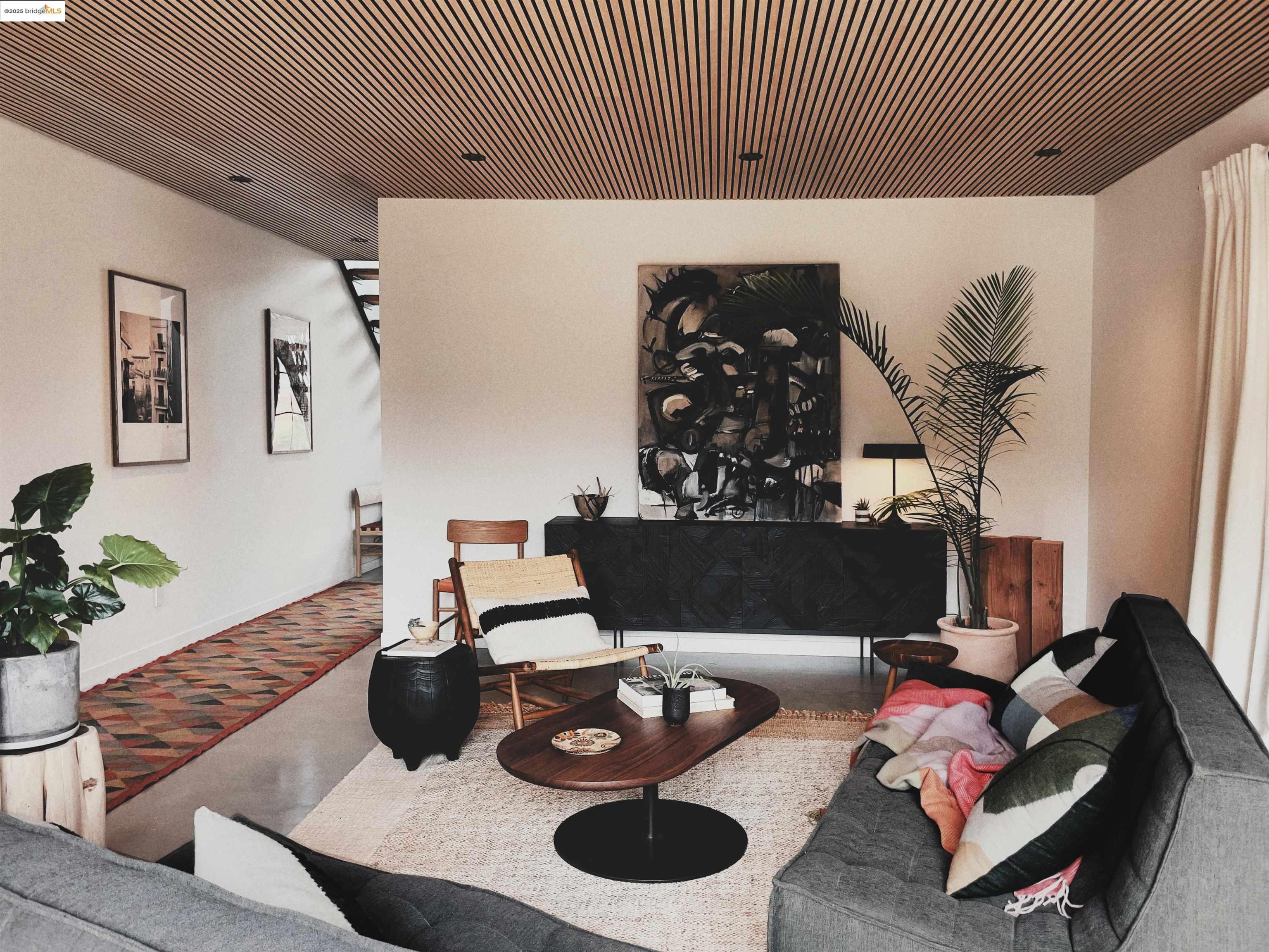 1818 Fifth Street Berkeley, CA 94710 - Photo 14 of 29 a living room with furniture and a potted plant