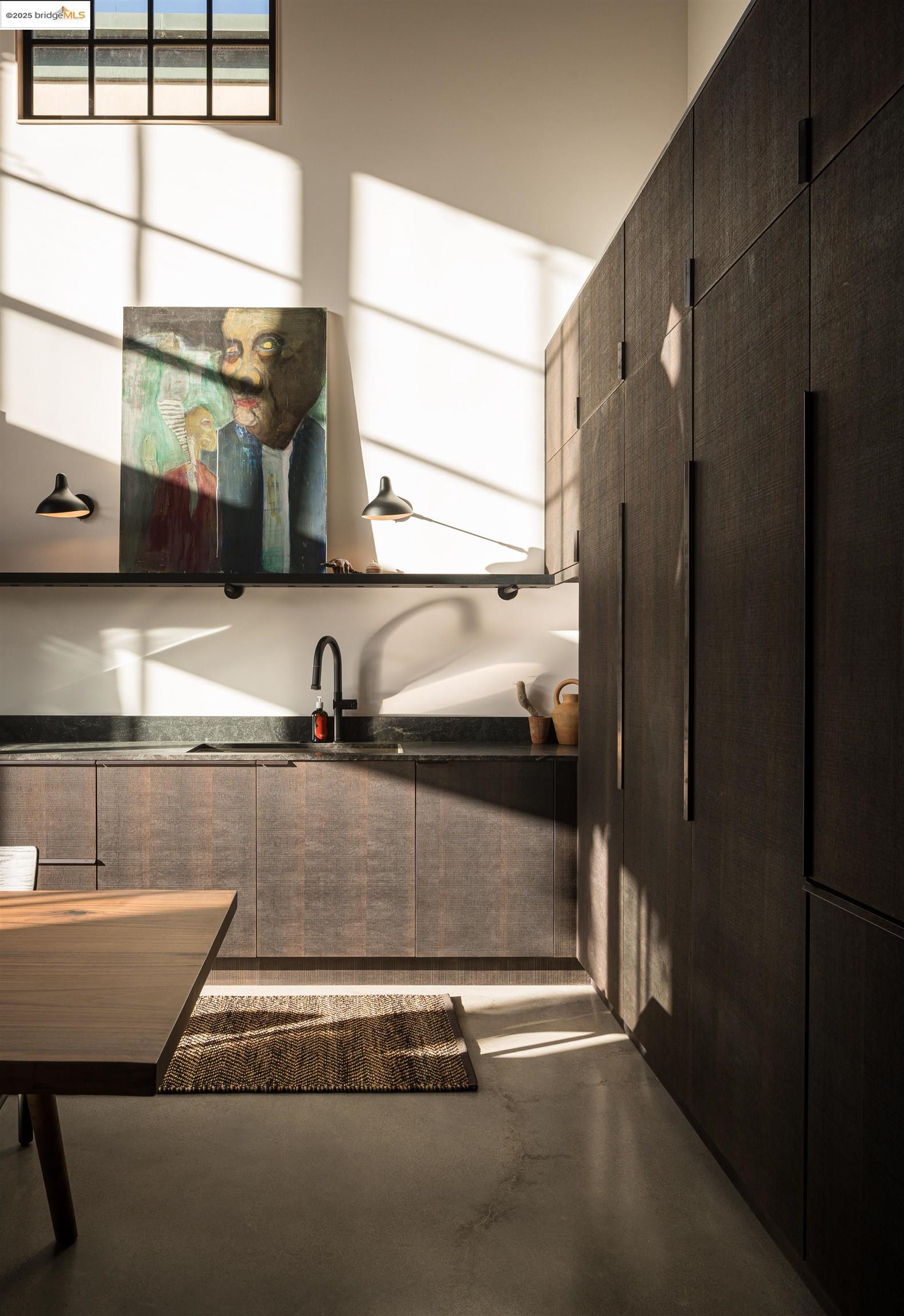 1818 Fifth Street Berkeley, CA 94710 - Photo 23 of 29 a kitchen with a sink and a refrigerator
