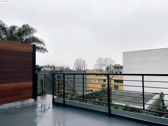 a view of a balcony with chair