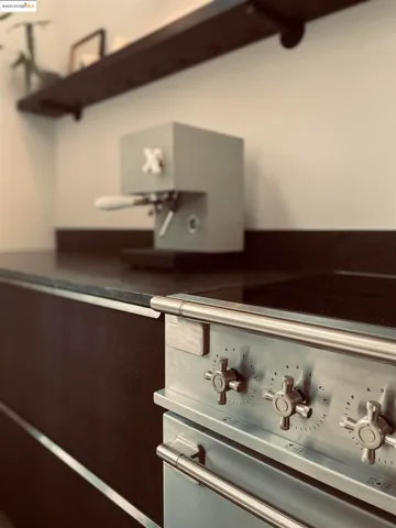 a close view of door with kitchen view