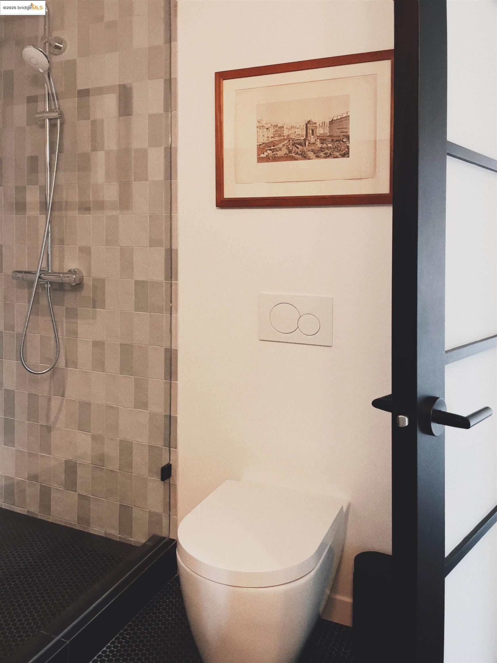 1818 Fifth Street Berkeley, CA 94710 - Photo 8 of 29 a bathroom with a toilet and a shower