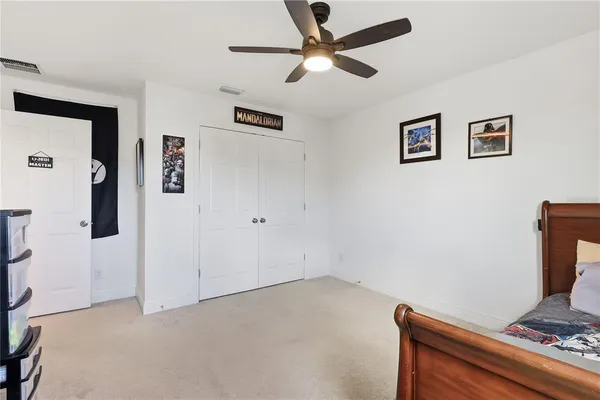 a bathroom with a shower and a toilet