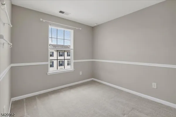 a view of balcony with furniture