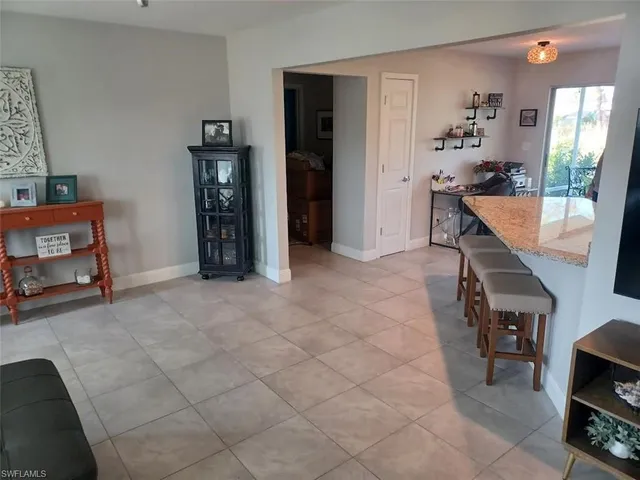 a view of a livingroom with furniture and toys