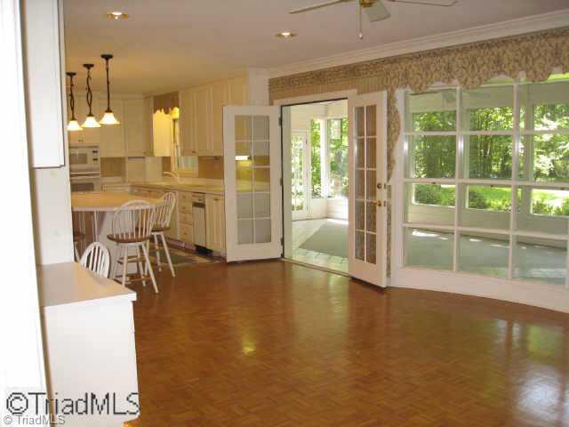 3320 North Rockingham Road Greensboro, NC 27407 - Photo 3 of 9 Other. Large kitchen with keeping room opens to gracious sunroom.