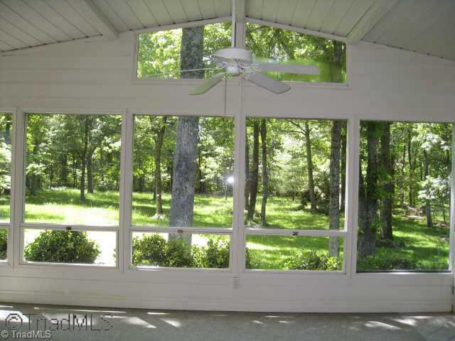3320 North Rockingham Road Greensboro, NC 27407 - Photo 4 of 9 Other. Gracious sun room overlooks over an acre of fenced lawn graced with priceless hardwood trees.