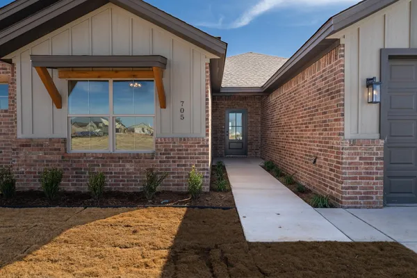 a front view of a house with a door