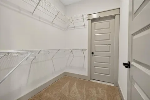 an aerial view of a house with yard swimming pool and outdoor seating