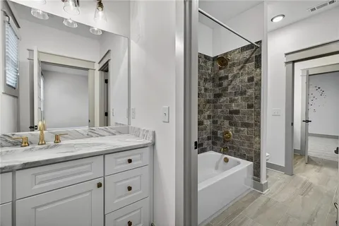 a aerial view of a house with a yard