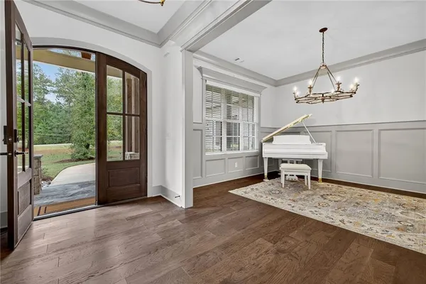 a kitchen with stainless steel appliances a kitchen island a stove and cabinets