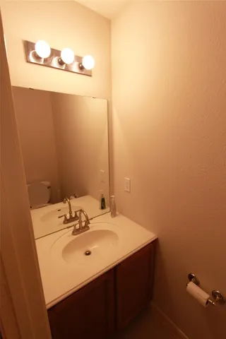 an empty room with a bathroom