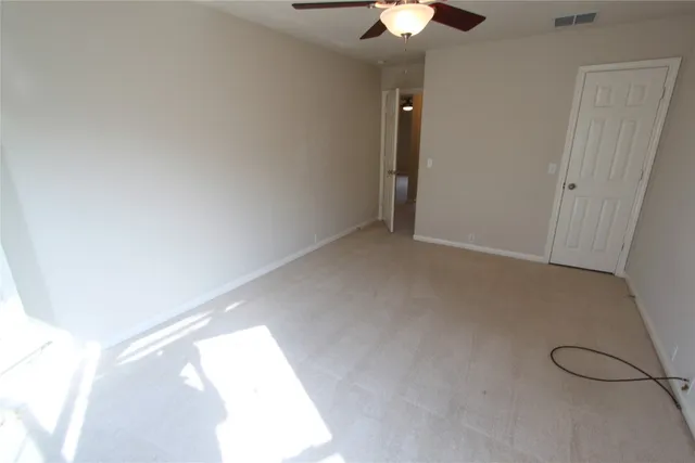 a bathroom with a sink mirror and a bathtub