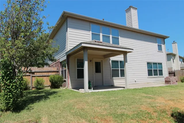 a view of a house with garden