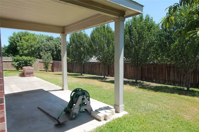 a swimming pool with wooden fence