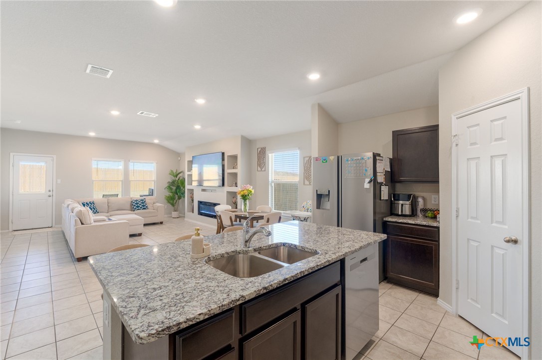 5105 Natalia Road Killeen, TX 76549 - Photo 5 of 15 a large kitchen with granite countertop lots of counter top space