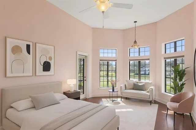 a bedroom with a bed and a mirror