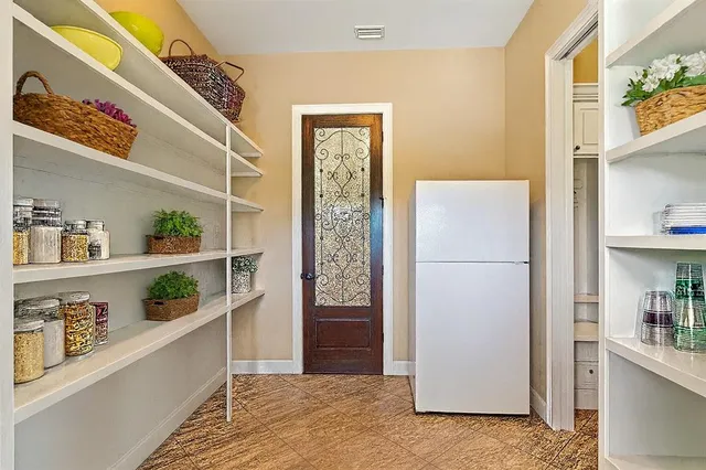a bathroom with a sink a toilet and vanity