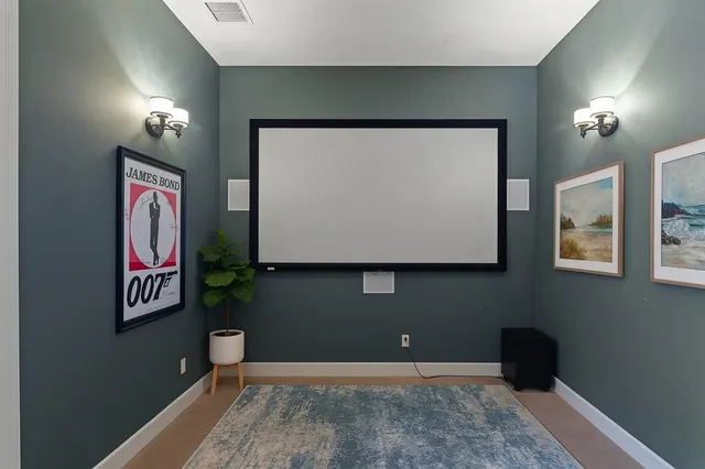 a outdoor space with lots of tables a garden view and chairs