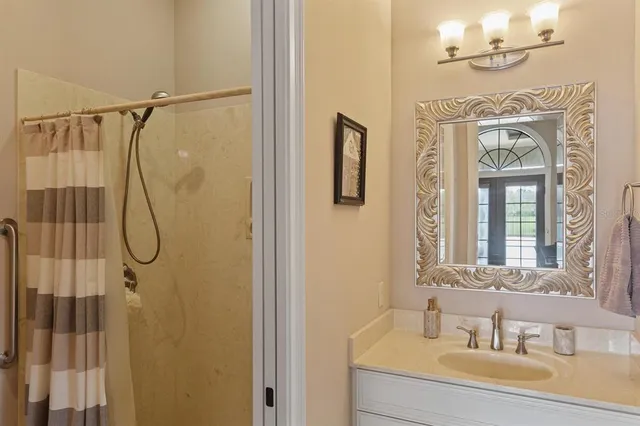 a front view of a building with trees