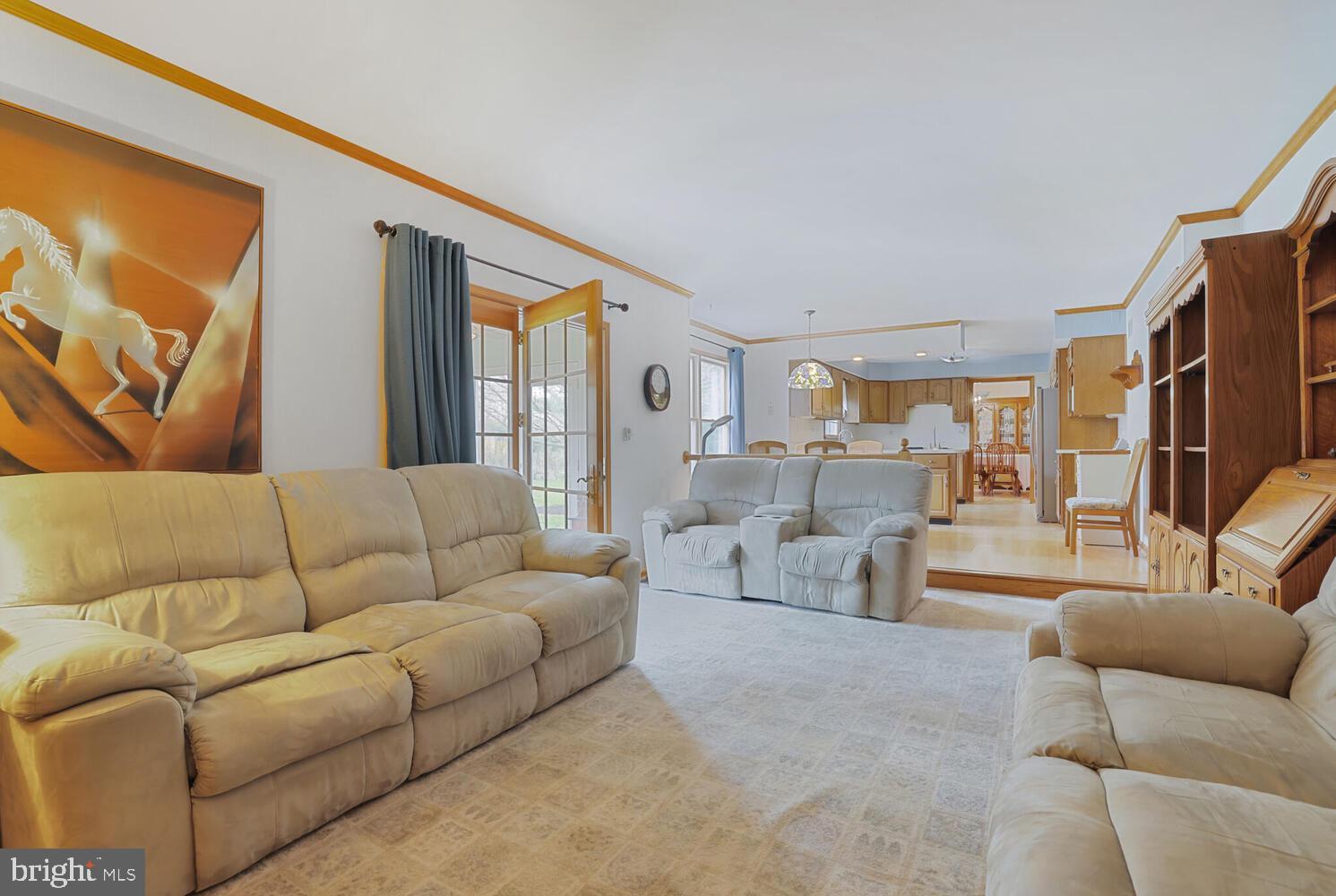 1050 Huntfield Road Westminster, MD 21157 - Photo 11 of 38 a living room with furniture and a large window