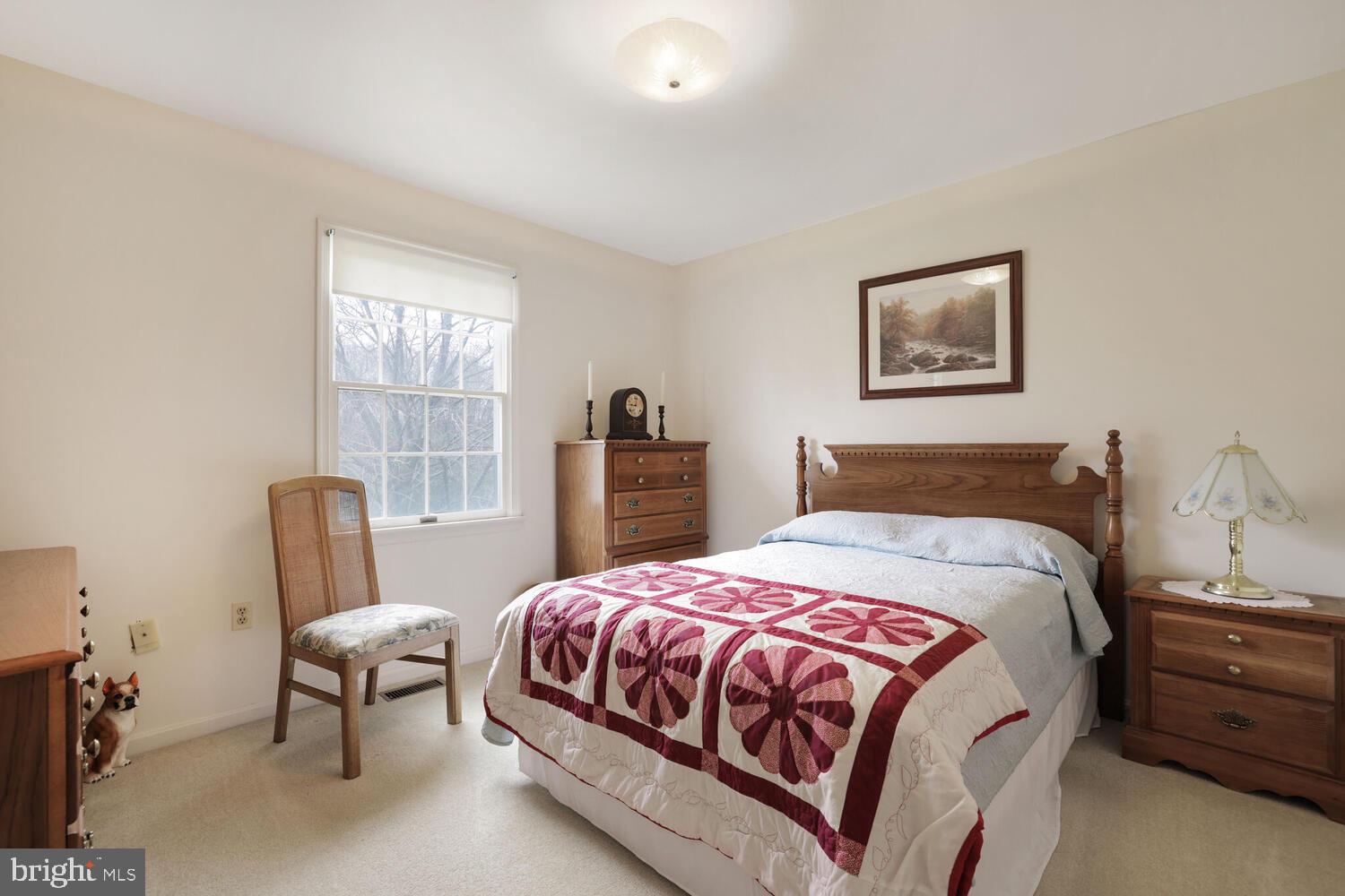 1050 Huntfield Road Westminster, MD 21157 - Photo 16 of 38 a bedroom with a bed chairs and window