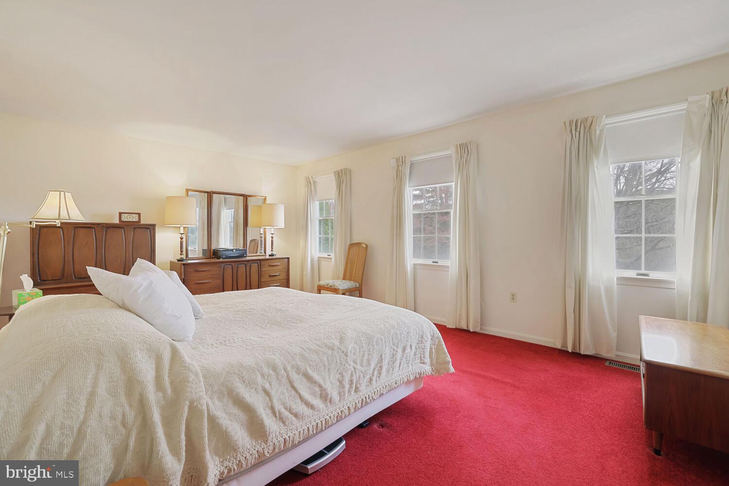 1050 Huntfield Road Westminster, MD 21157 - Photo 18 of 38 a bedroom with a bed and wooden floor