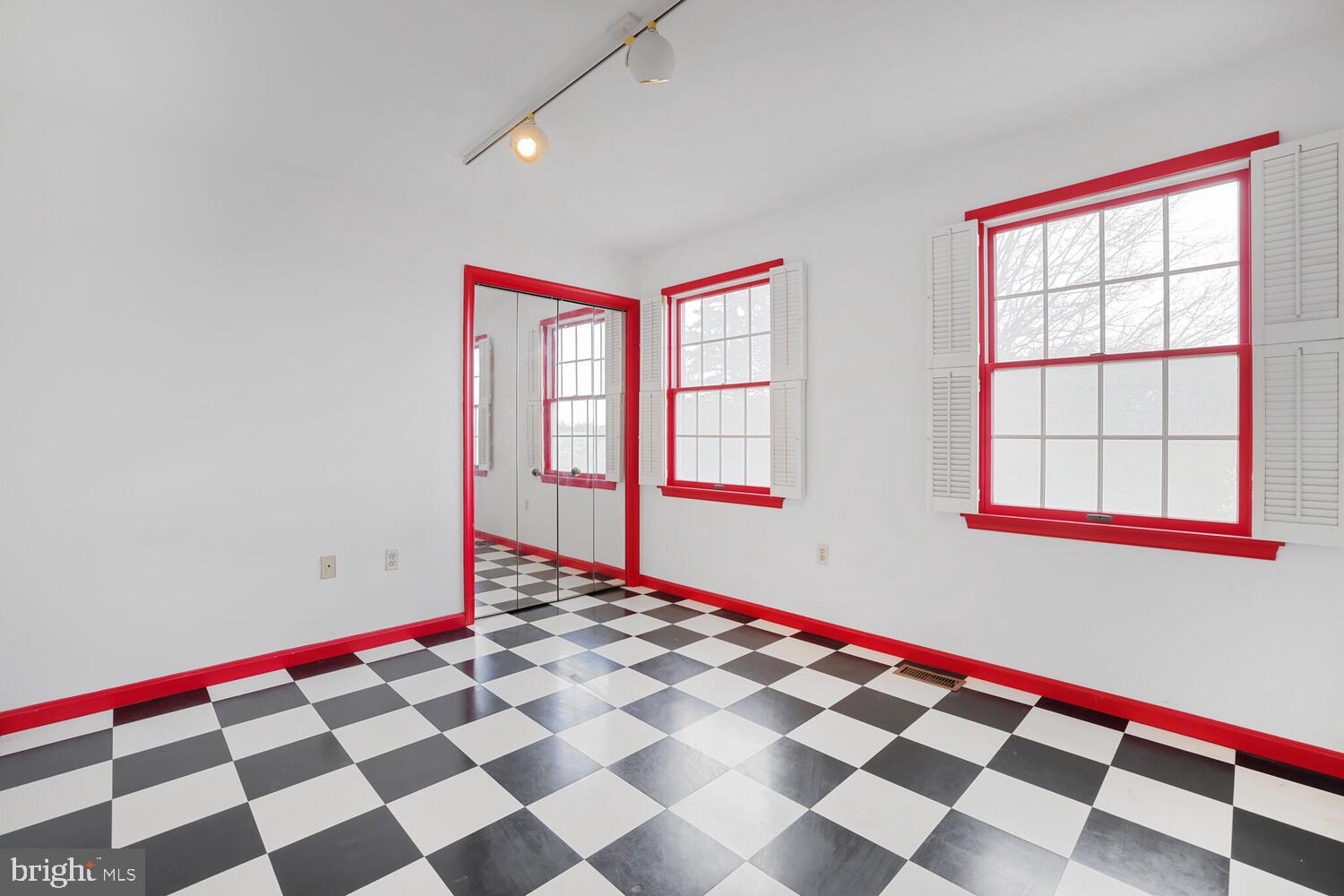 1050 Huntfield Road Westminster, MD 21157 - Photo 22 of 38 a view of empty room with windows