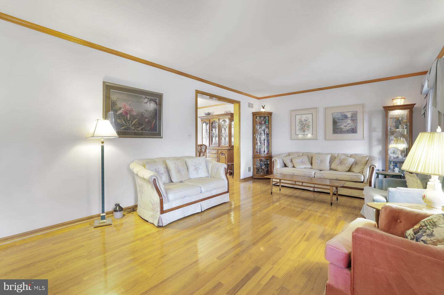 1050 Huntfield Road Westminster, MD 21157 - Photo 5 of 38 a living room with furniture and a large window