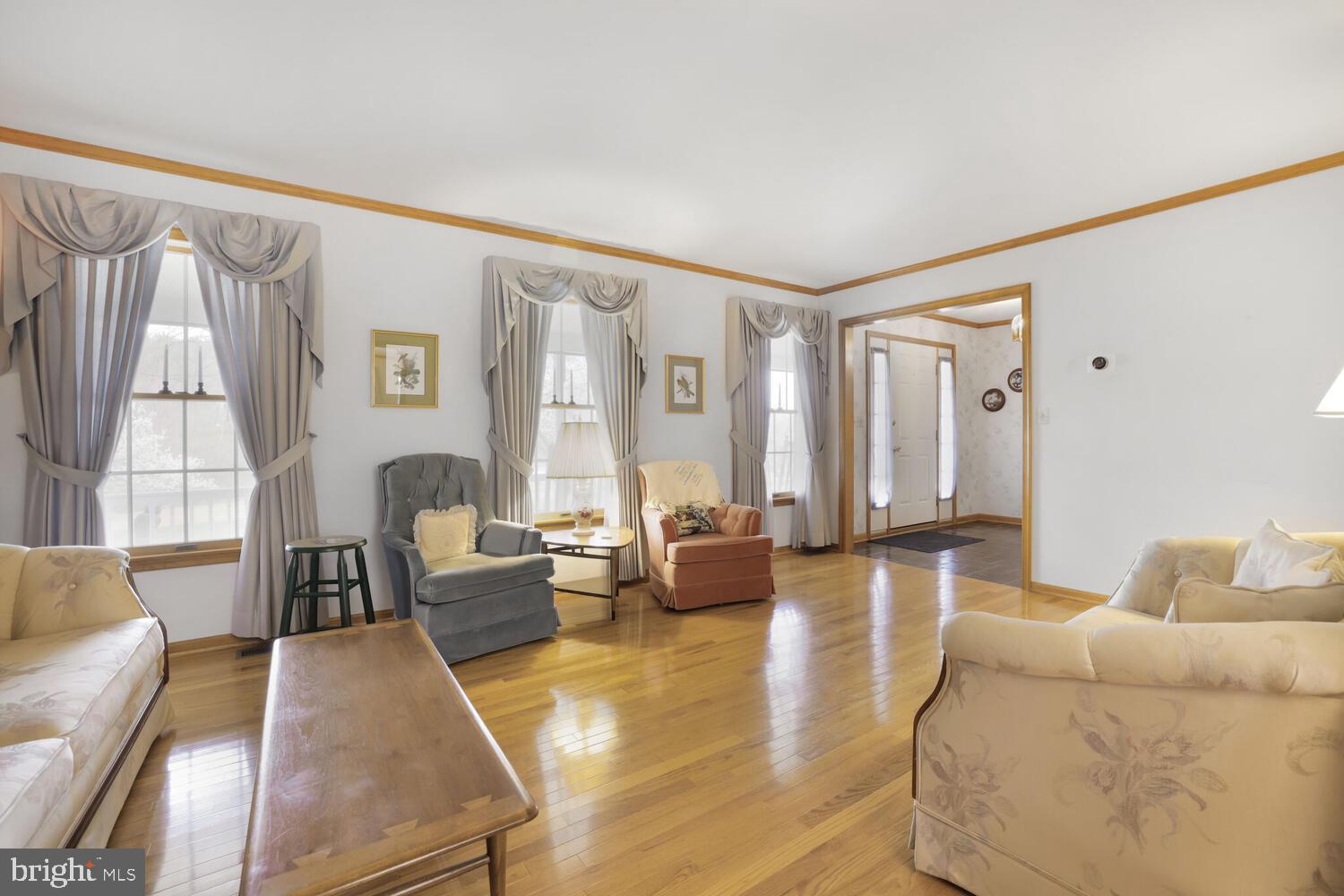 1050 Huntfield Road Westminster, MD 21157 - Photo 6 of 38 a living room with furniture and a large window