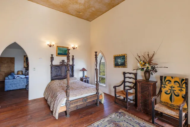 a bathroom with a sink mirror and vanity
