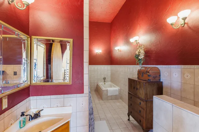 a bedroom with a bed and a closet