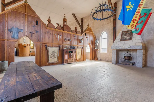 a view of a chairs with a small yard