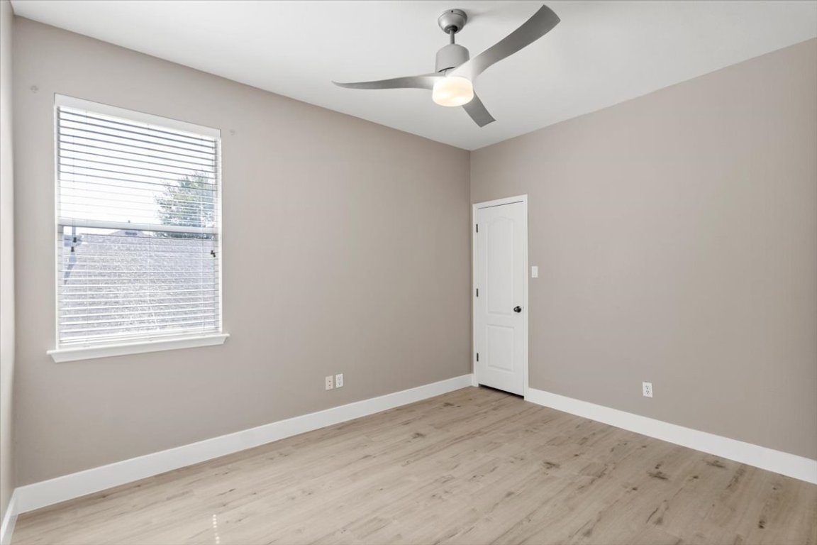 3702 Tall Cedars Road Cedar Park, TX 78613 - Photo 17 of 34 an empty room with a window