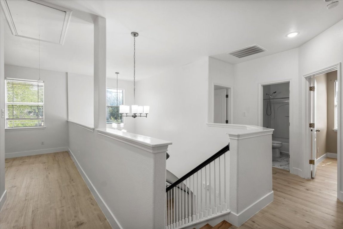 3702 Tall Cedars Road Cedar Park, TX 78613 - Photo 24 of 34 a bathroom with a sink a mirror and a shower