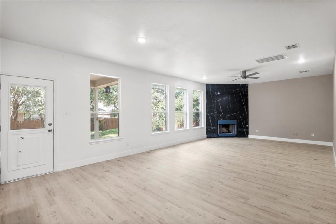 3702 Tall Cedars Road Cedar Park, TX 78613 - Photo 6 of 34 an empty room with windows and closet