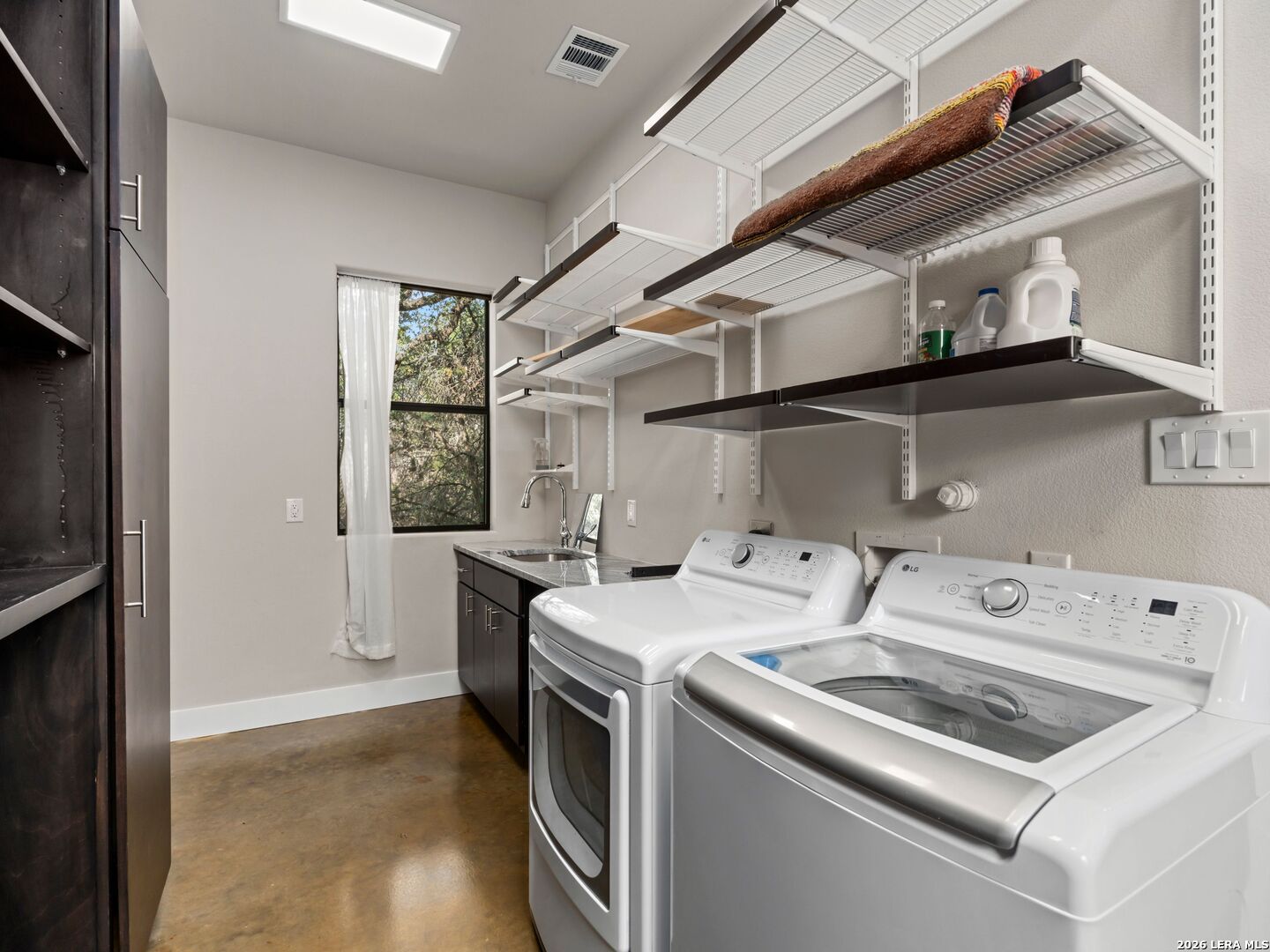 1146 Victoria Avenue Spring Branch, TX 78070 - Photo 24 of 89 a utility room with dryer and washer